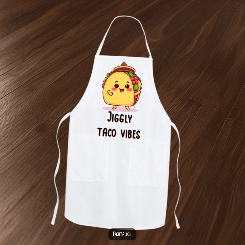 Funny taco apron showing a smiling taco shell in a sombrero doing a jig, designed for cooks who love humor and festive vibes.
